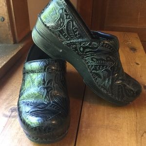 Dansko XP Black tooled leather clogs